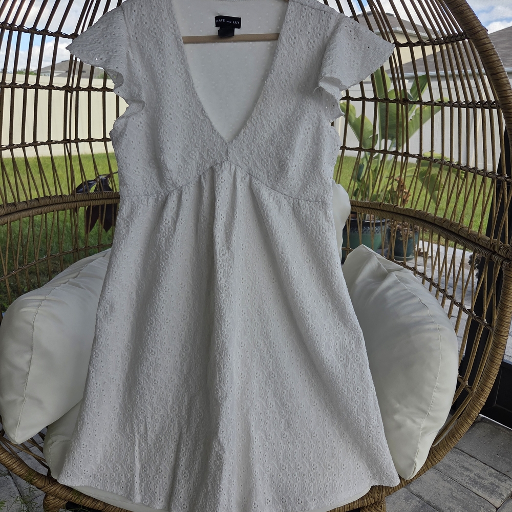 Elegant White Mini Dress with Eyelet Design